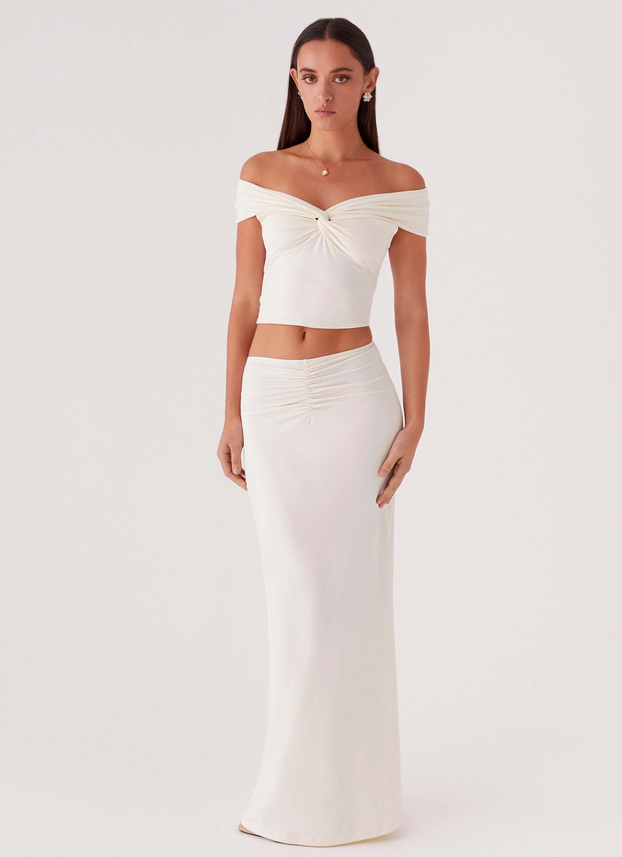 Trixie Twist Off Shoulder Top - Ivory LightweightTexture Flowing Design