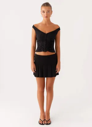 Ultra Soft Shelby Pleated Mini Skirt - Black Shelby Pleated Mini Skirt - Black Cuffed hem Velvet Finish