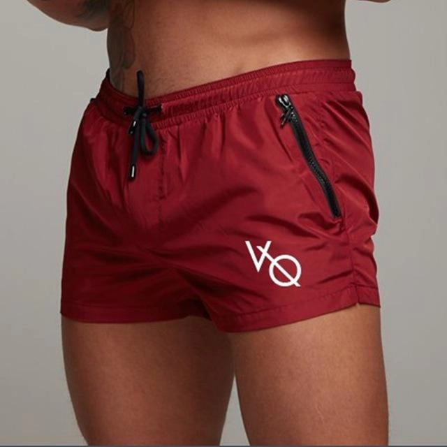 West Louis? Sporting Bermuda Beach Shorts